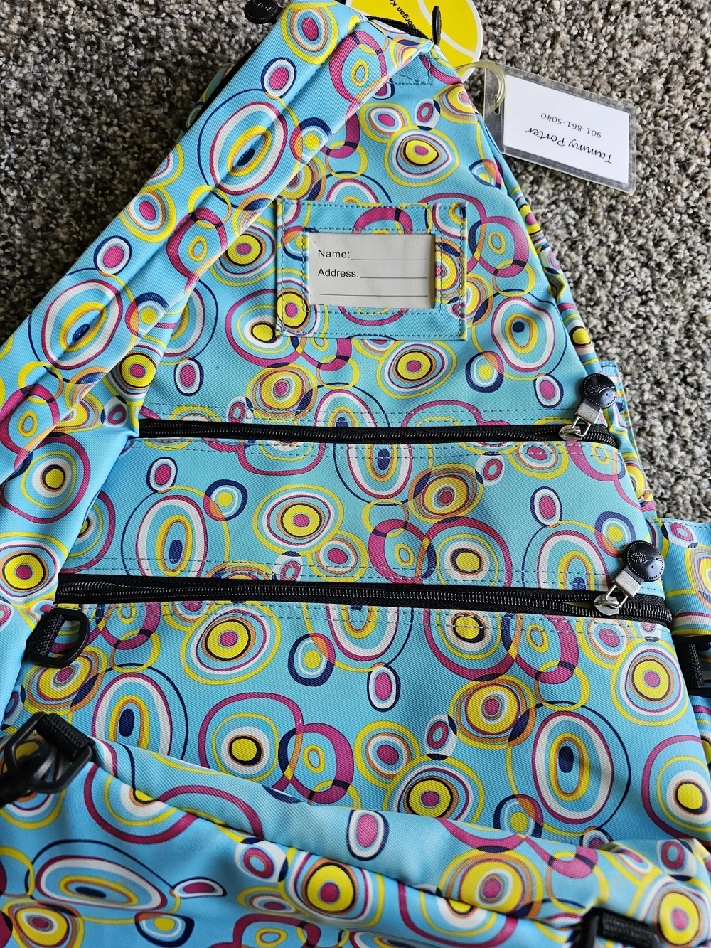 Jetpac Colorful Circle Print Sling Backpack - Turquoise, Yellow, Pink